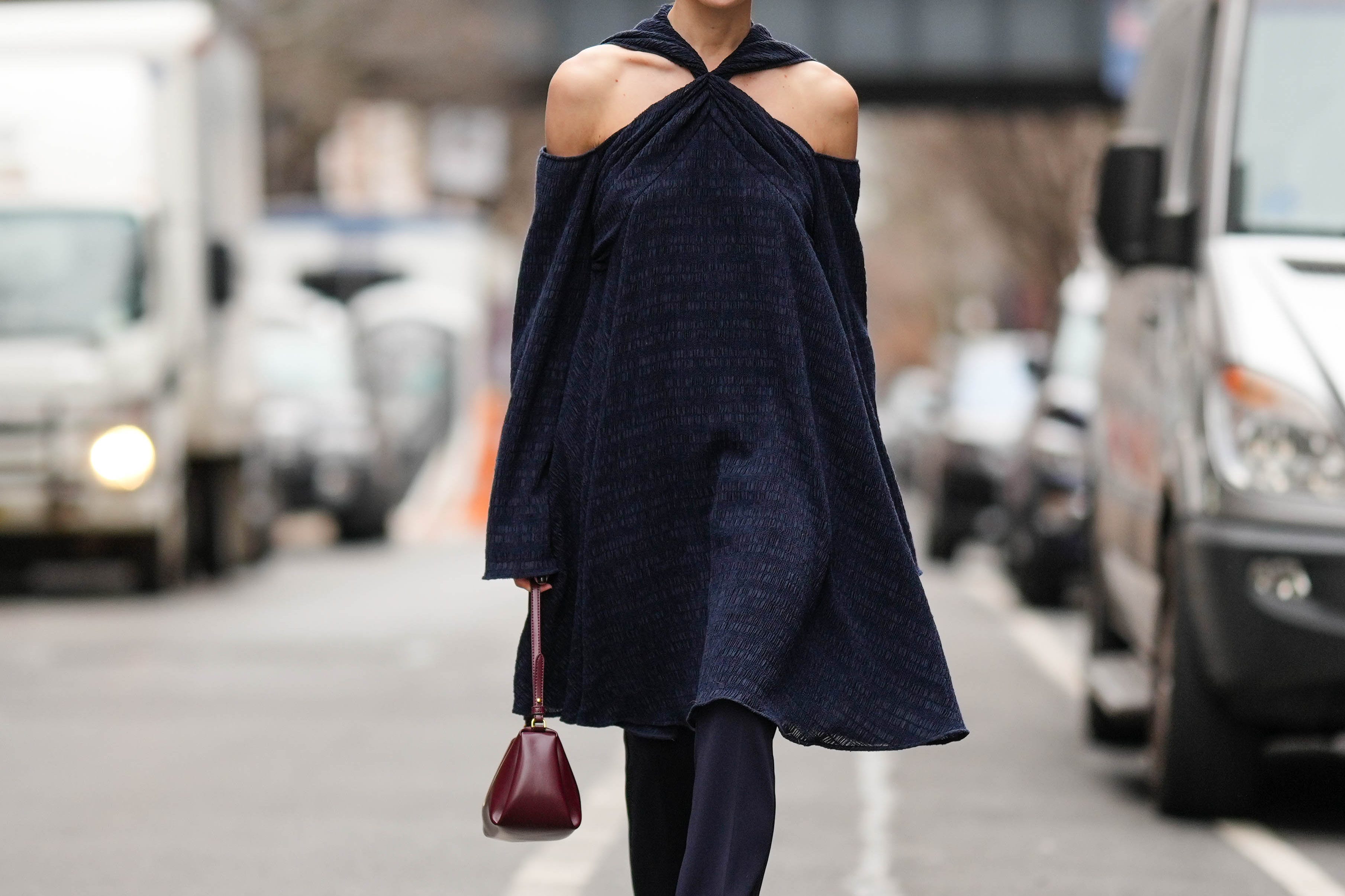 Woman wearing top with shoulders exposed