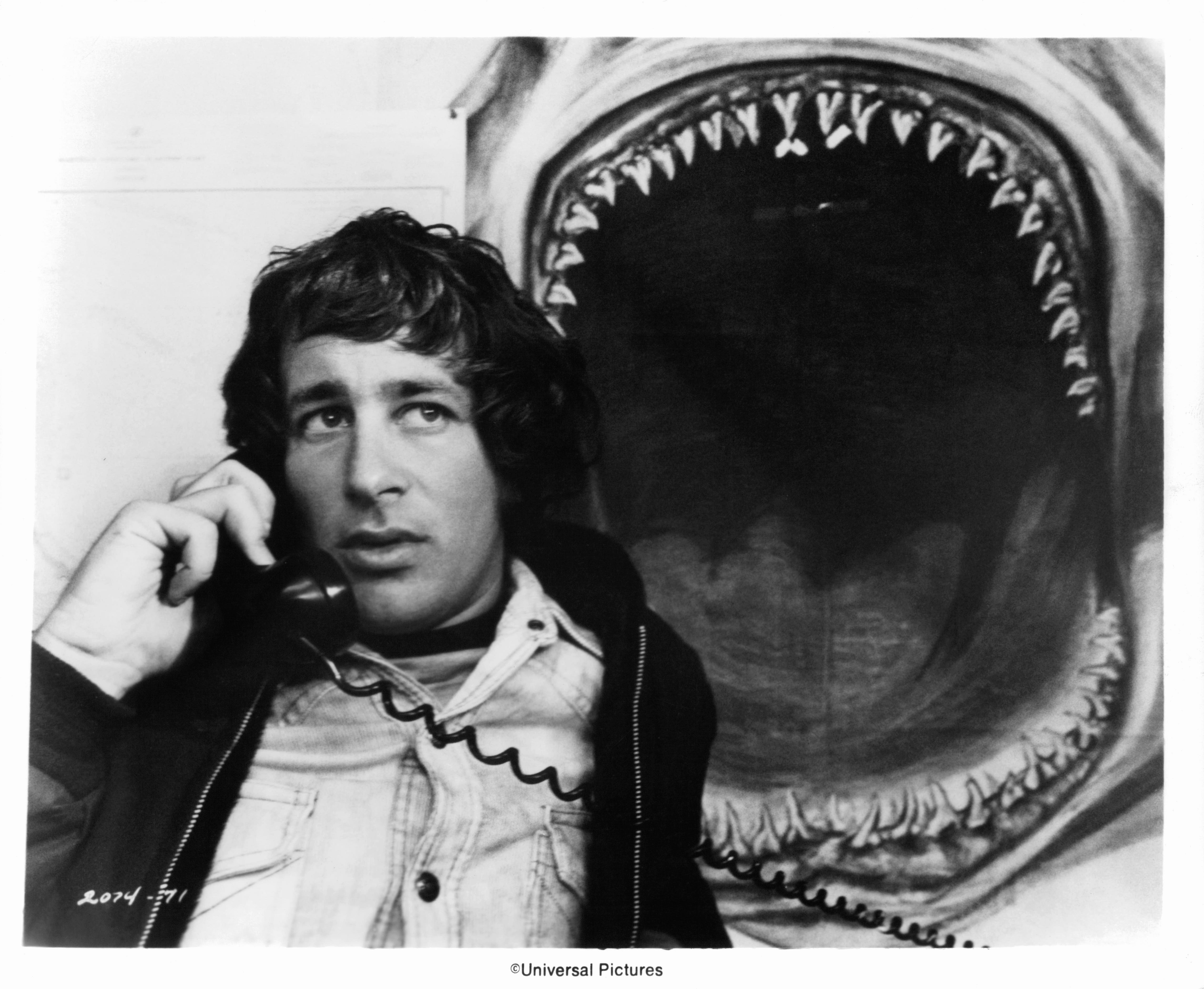 Steven Spielberg on set of the film 'Jaws', 1975.