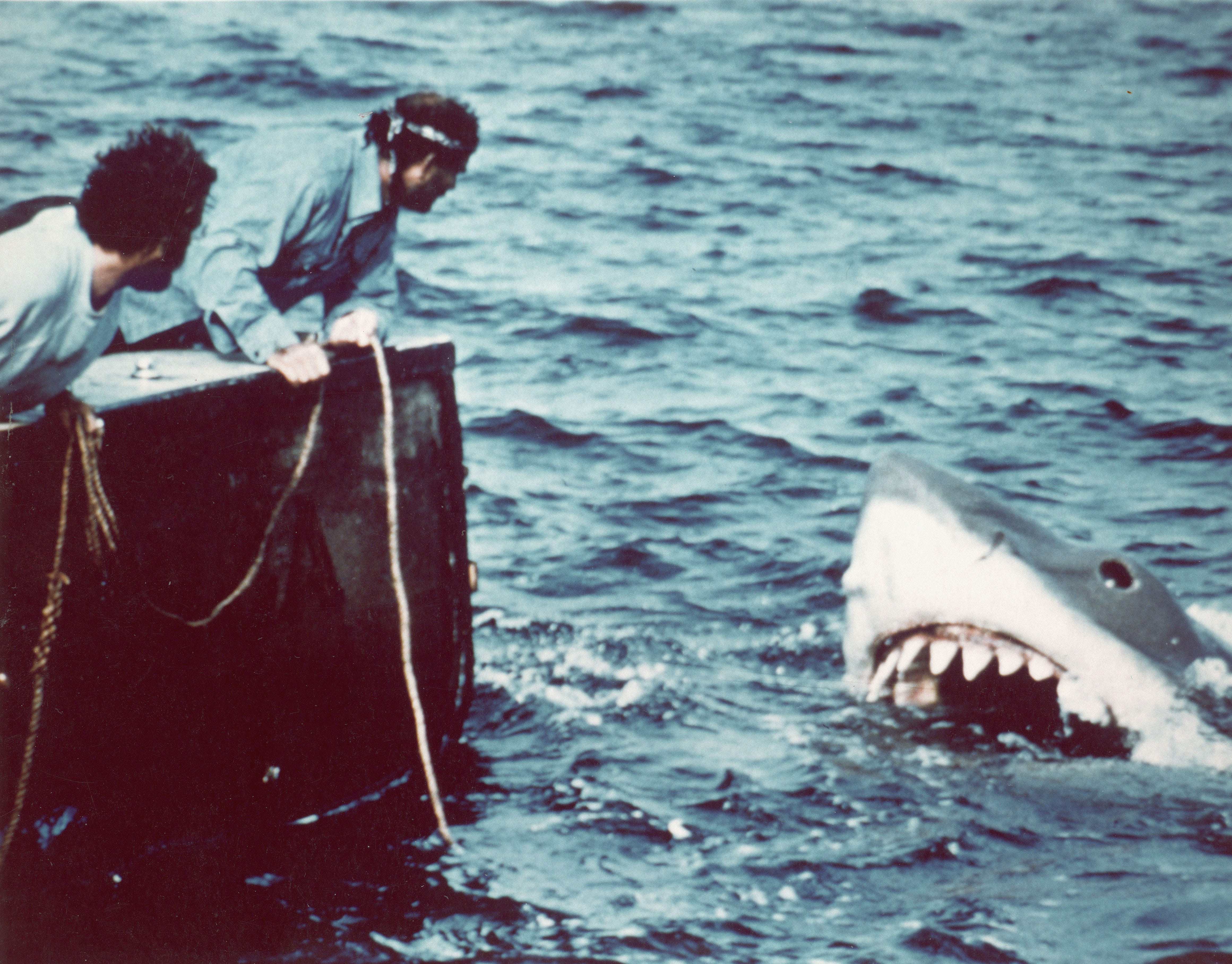 A scene from "Jaws" shows Richard Dreyfuss (left) as marine biologist Hooper and British author and actor Robert Shaw as shark fisherman Quint.
