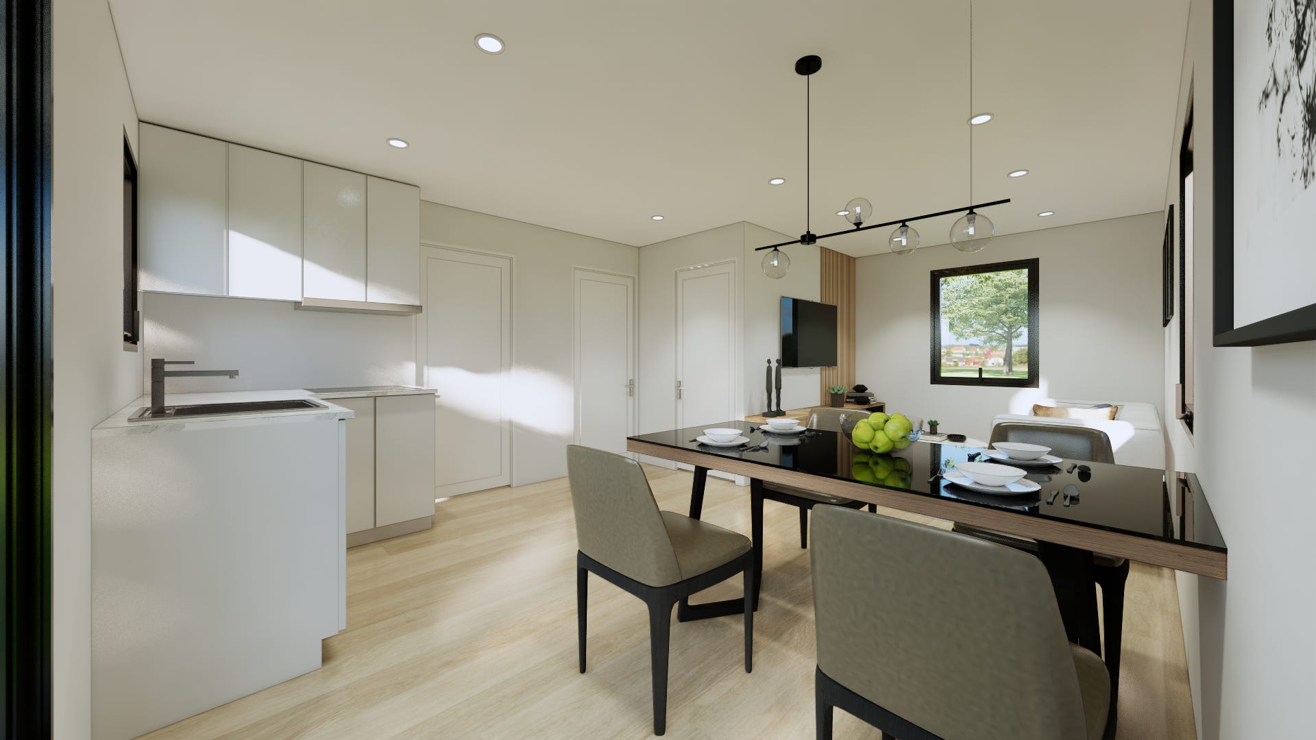 A furnished dining area in Hapi Homes. There are white cabinets in the kitchen to the left of the photo, faux quartz countertops, and a stove. To the right of the photo, there is a black four-top dining table with a light hanging above and two gray chairs.