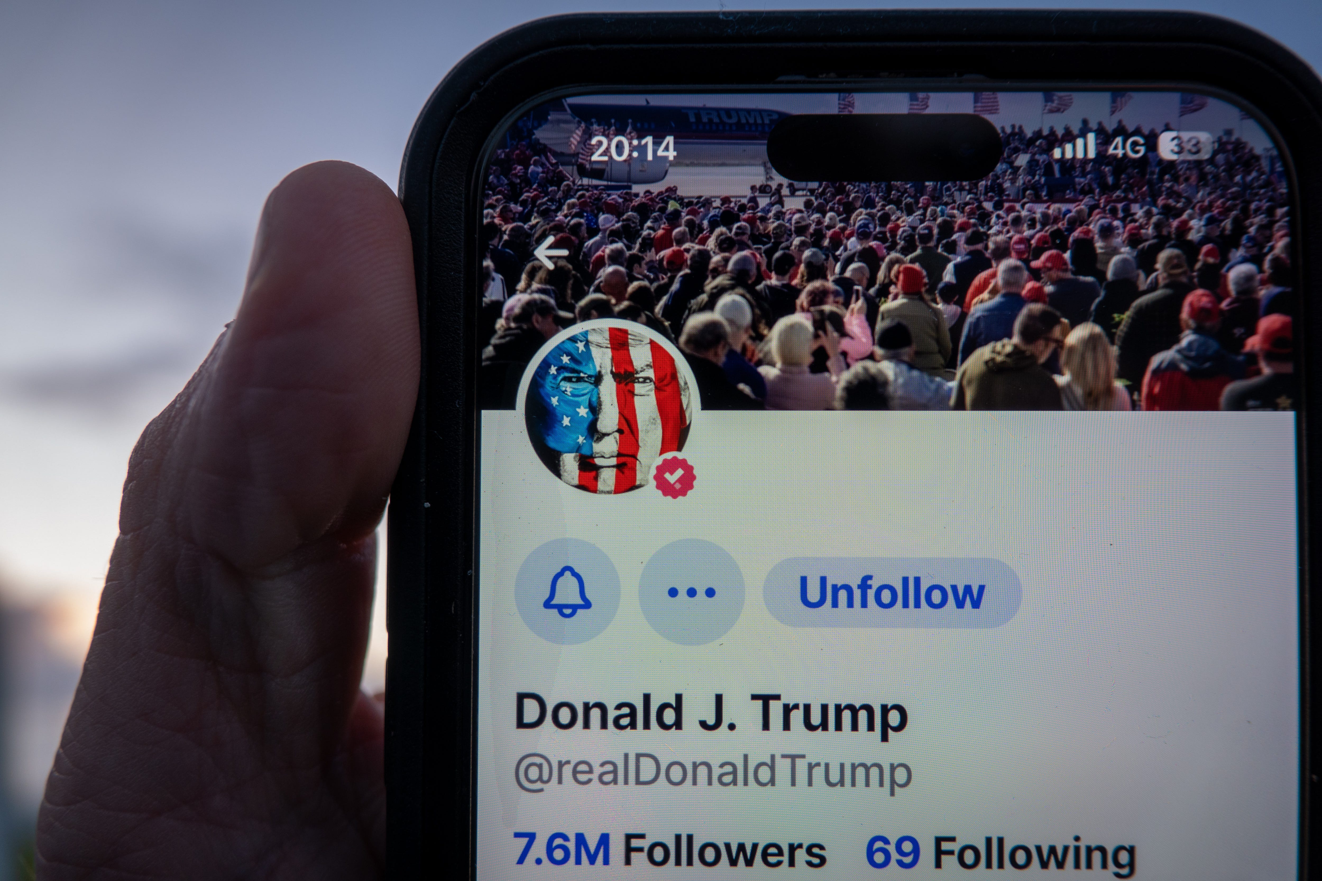 A phone displaying Donald Trump's account on Truth Social