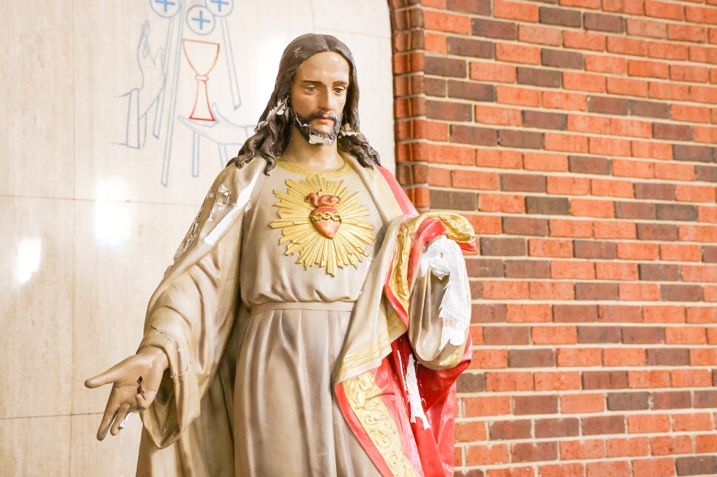 The damaged Sacred Heart statue is over 110 years old.