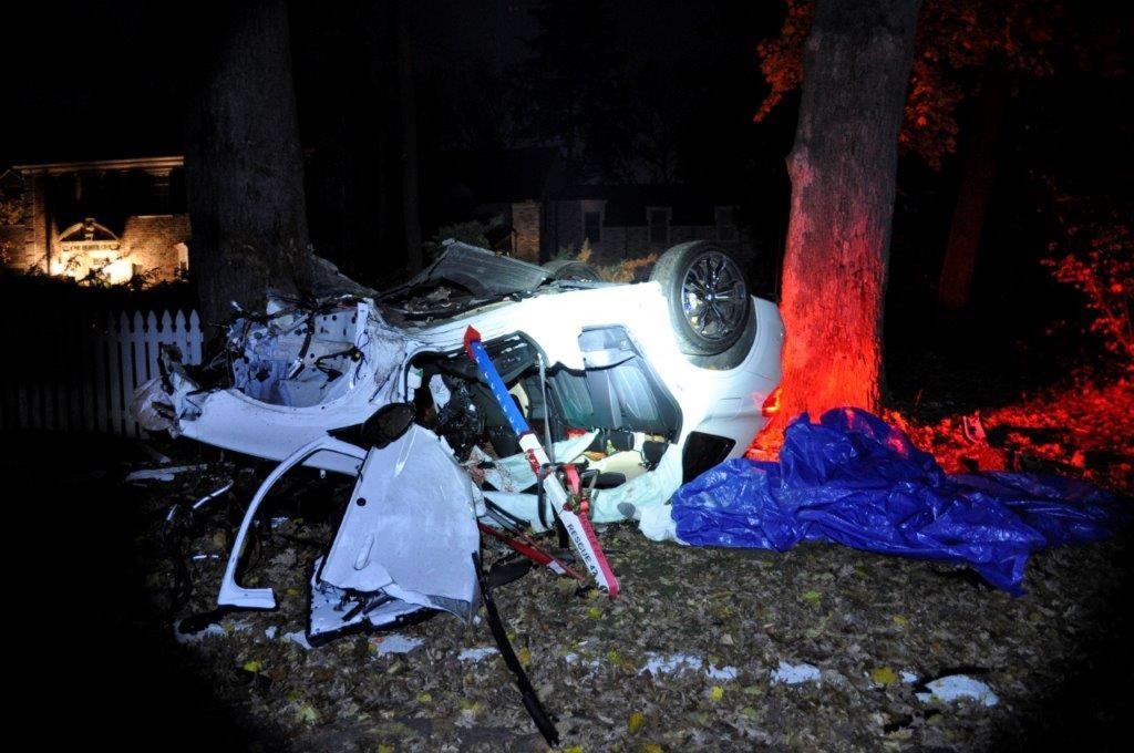 Wrecked car overturned after a high-speed crash.