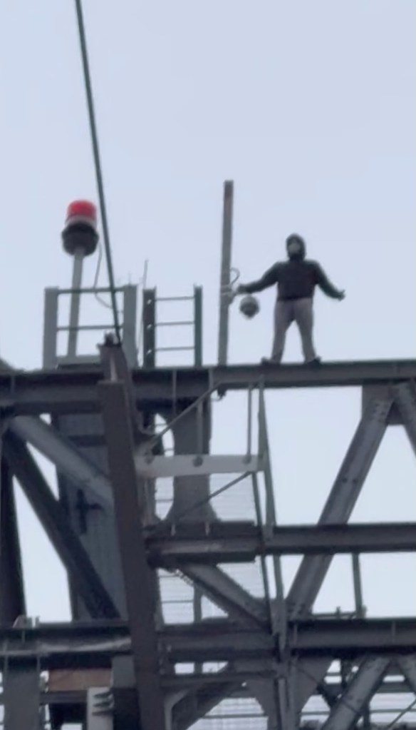 A young man climbed the support beams of the Roosevelt Island Tramway in New York City on June 15, 2025.