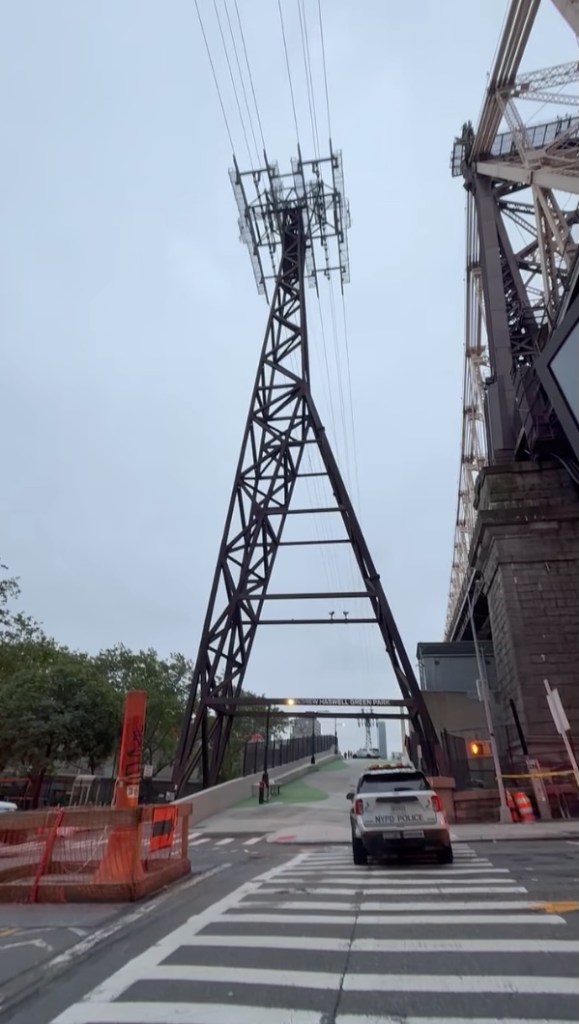 Cops responded to the tramway and used climbing gear to make their way up to the suspect as an NYPD helicopter hovered overhead.