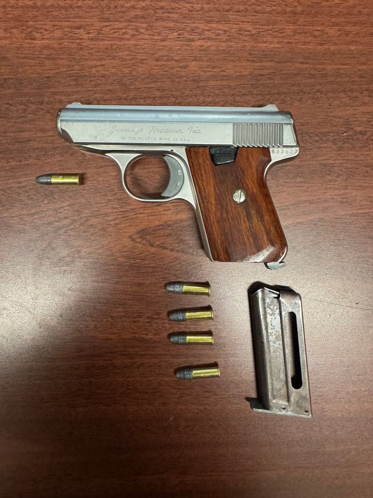 Seized Jennings Firearms handgun with bullets and magazine.