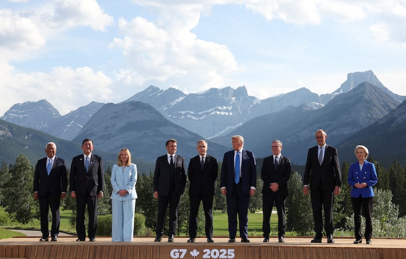 G7 leaders pose a family photo the summit at the Kananaskis Country Golf Course in Kananaskis, Alberta, Canada.