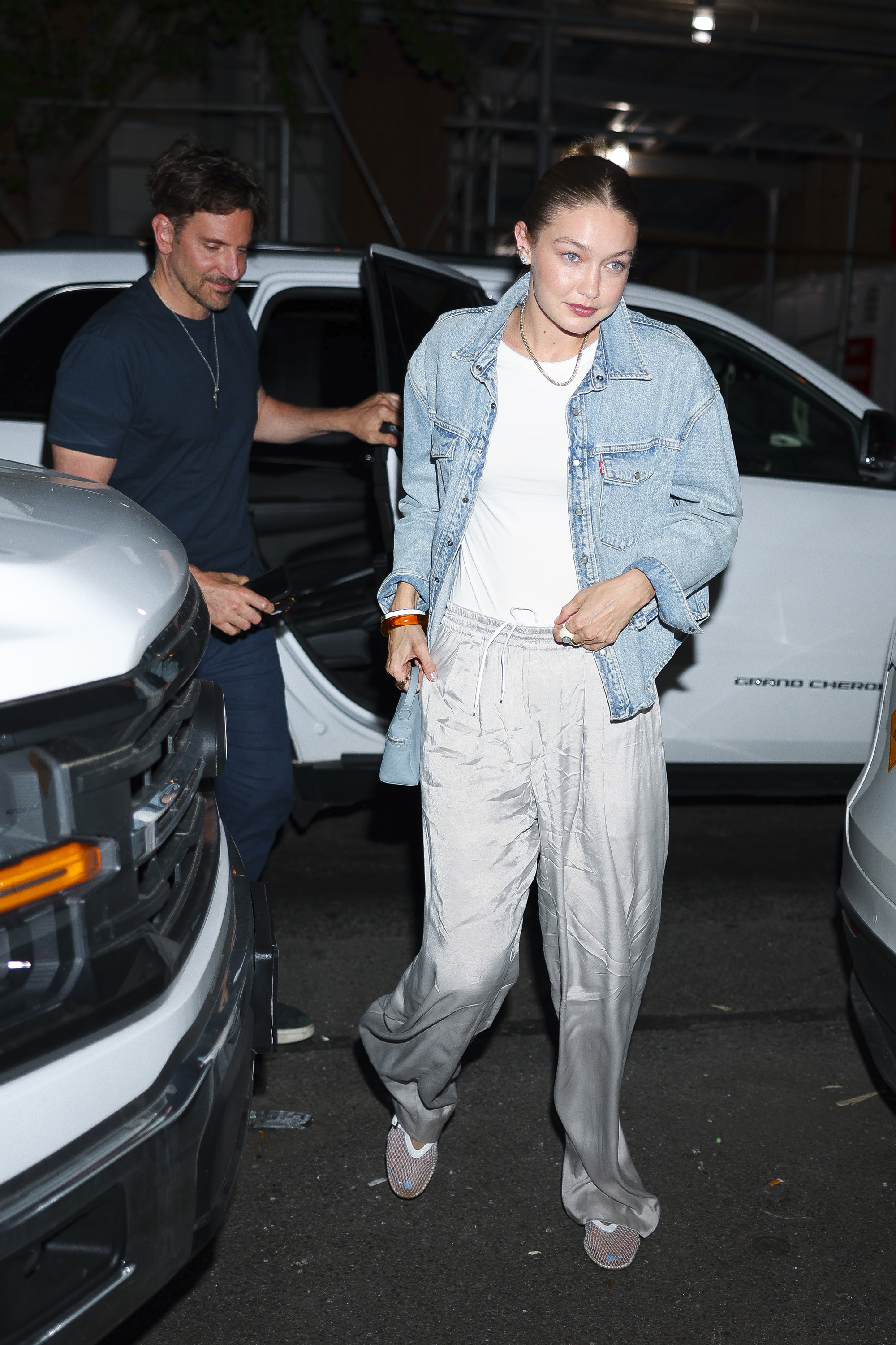 Bradley Cooper and Gigi Hadid outside a restaurant. 