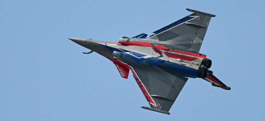 A Rafale fighter jet performs during an exhibition flight demonstration as part of the Paris Air Show at the ParisLe Bourget Airport on June 17, 2025. 
