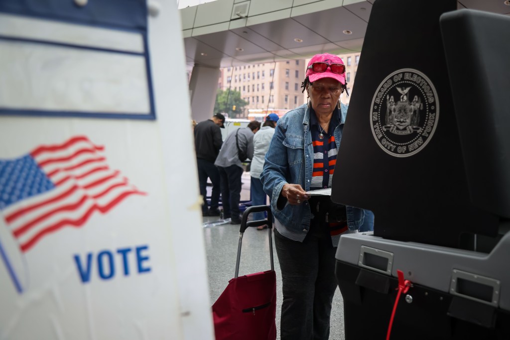 Woman voting at a polling station.