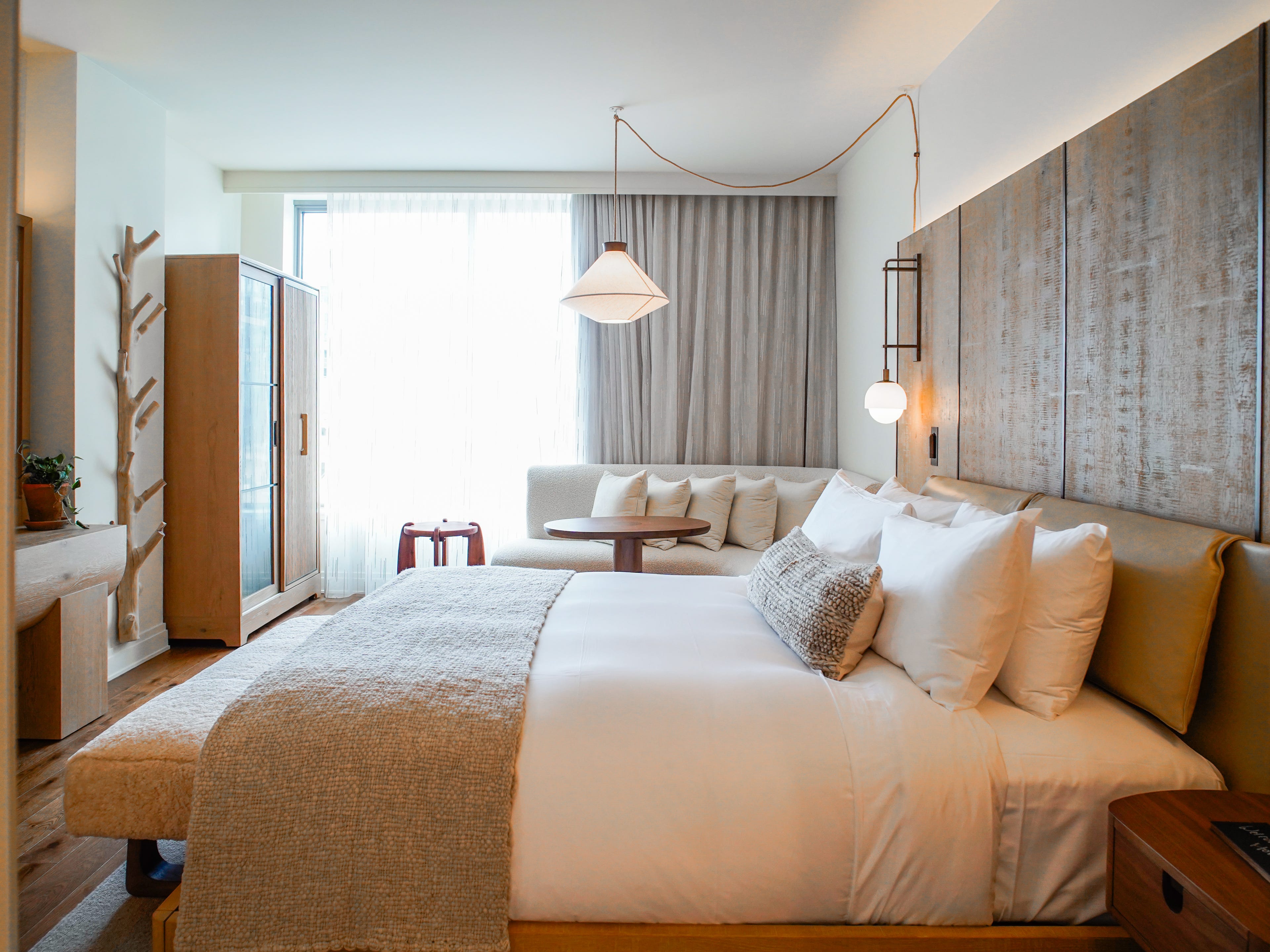 Inside a neutral-toned room at 1 Hotel Seattle
