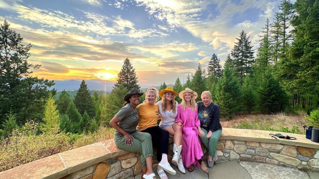 Candice King, Julie Plec and Carina Adly Mackenzie with friends on vacation.