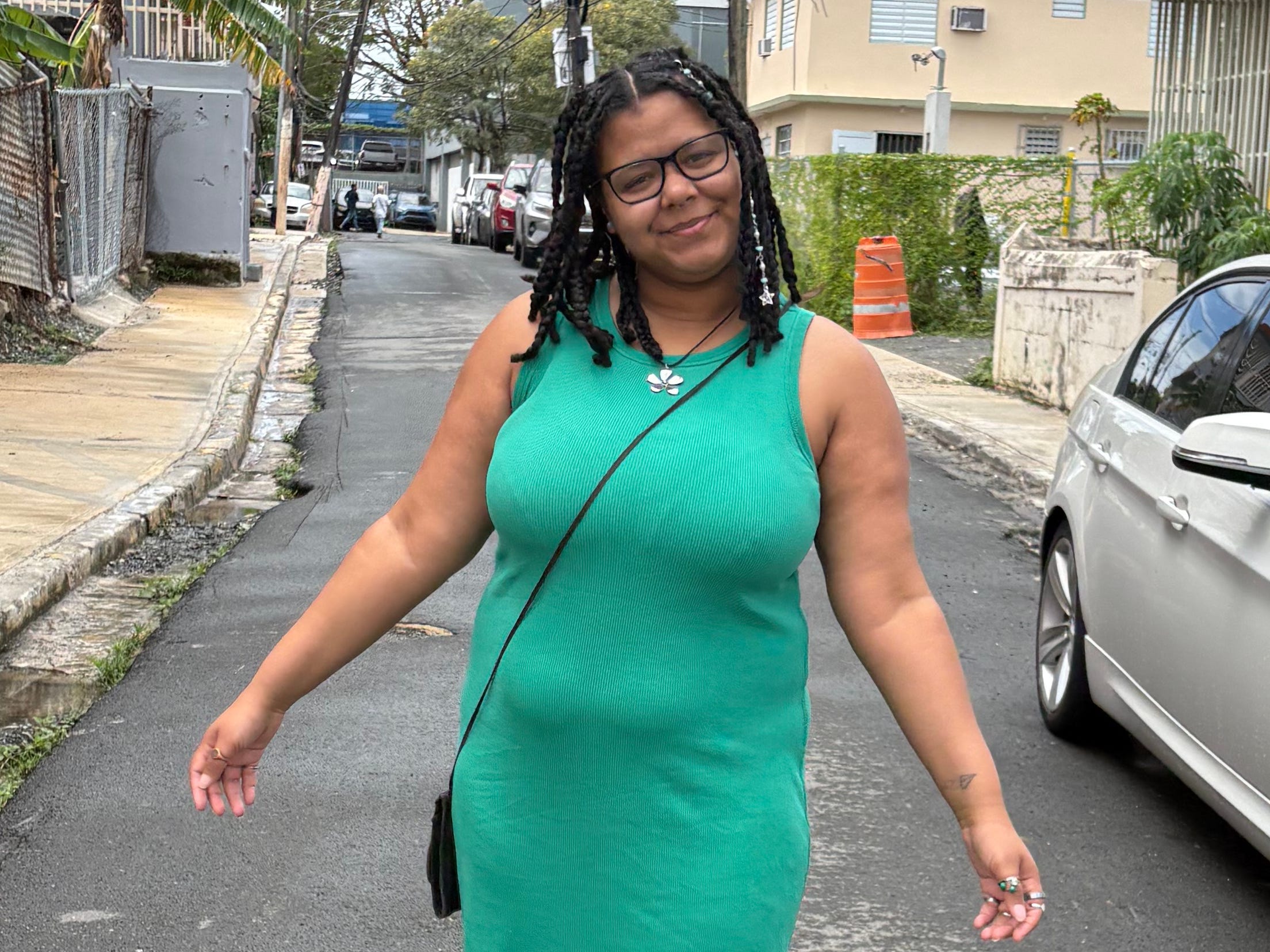 The author posing on a street in San Juan.