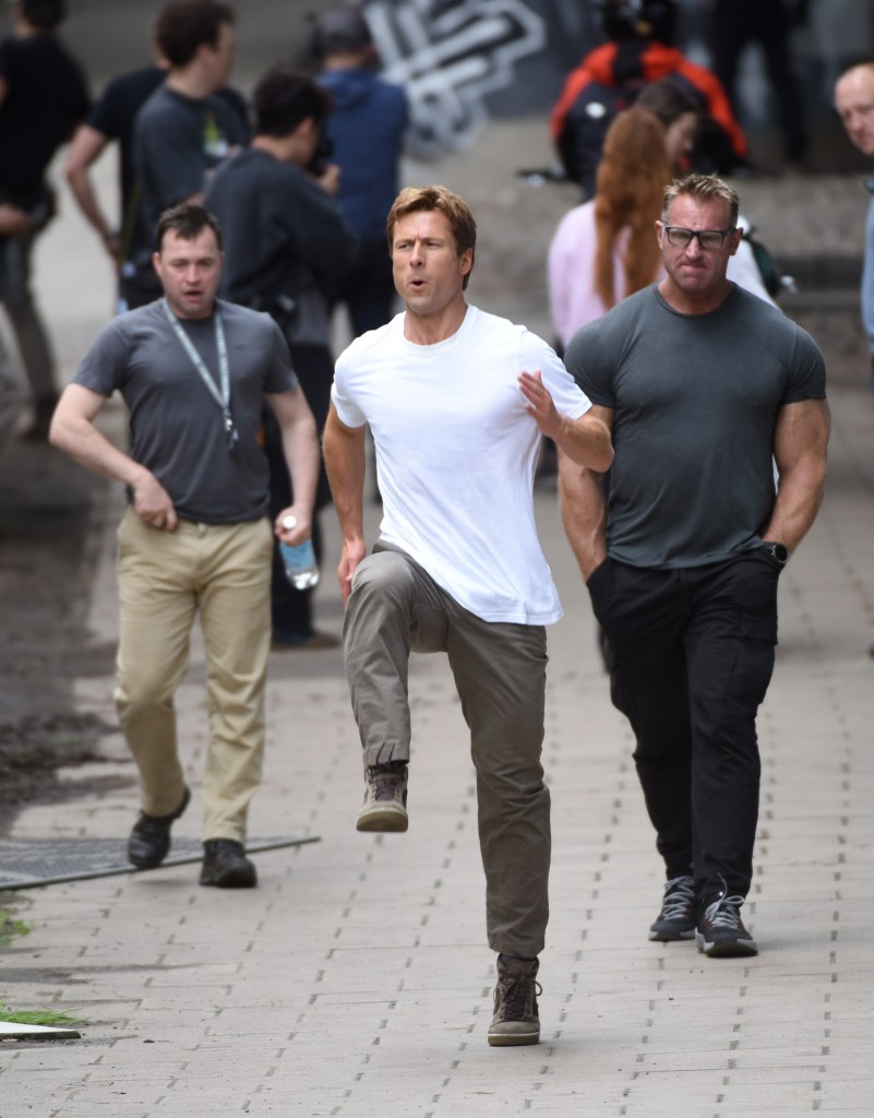 Glen Powell prepares for some stunts while on the set of his new film in Scotland.a