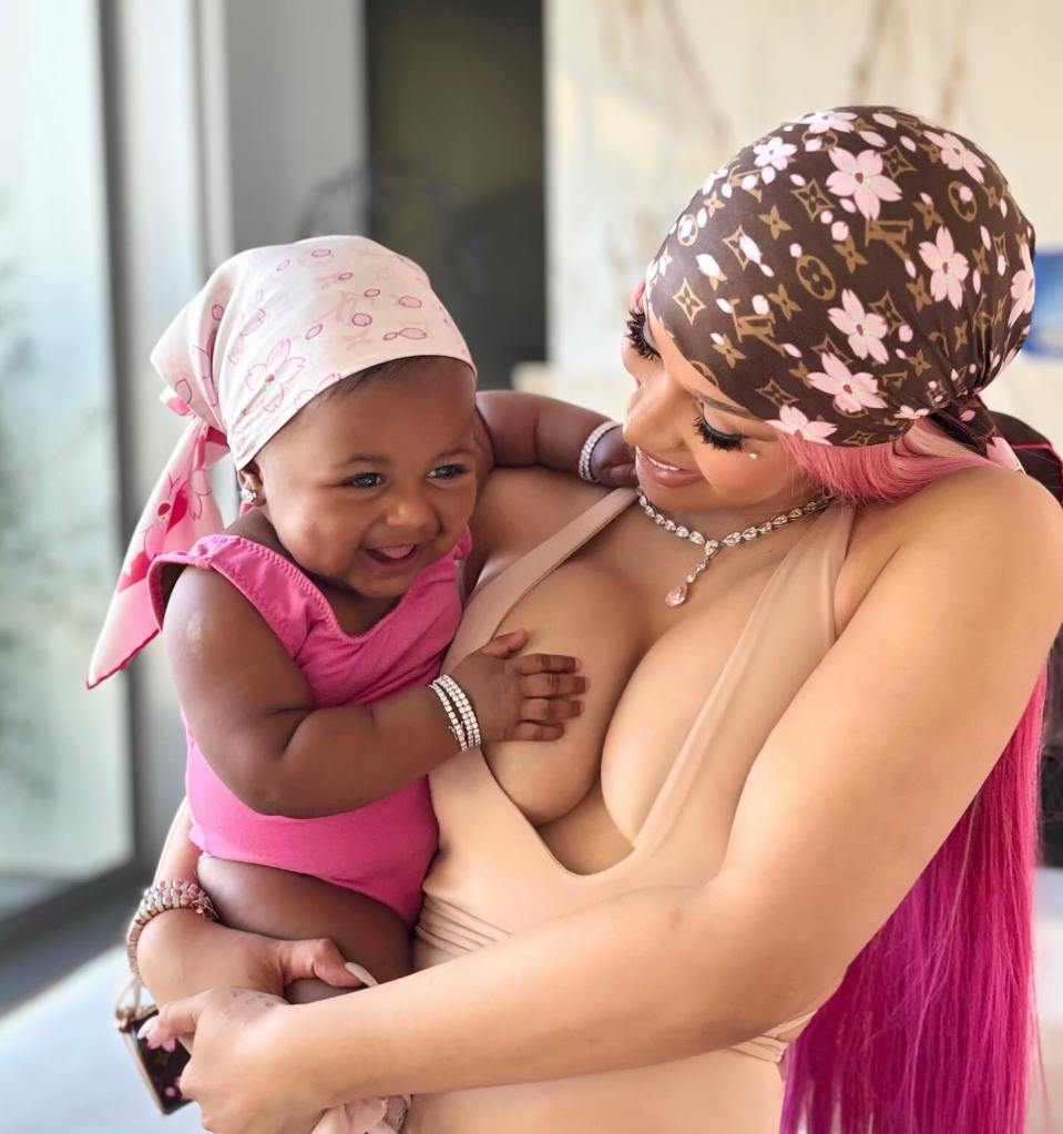 Cardi B and daughter Blossom pose for a sweet snap.