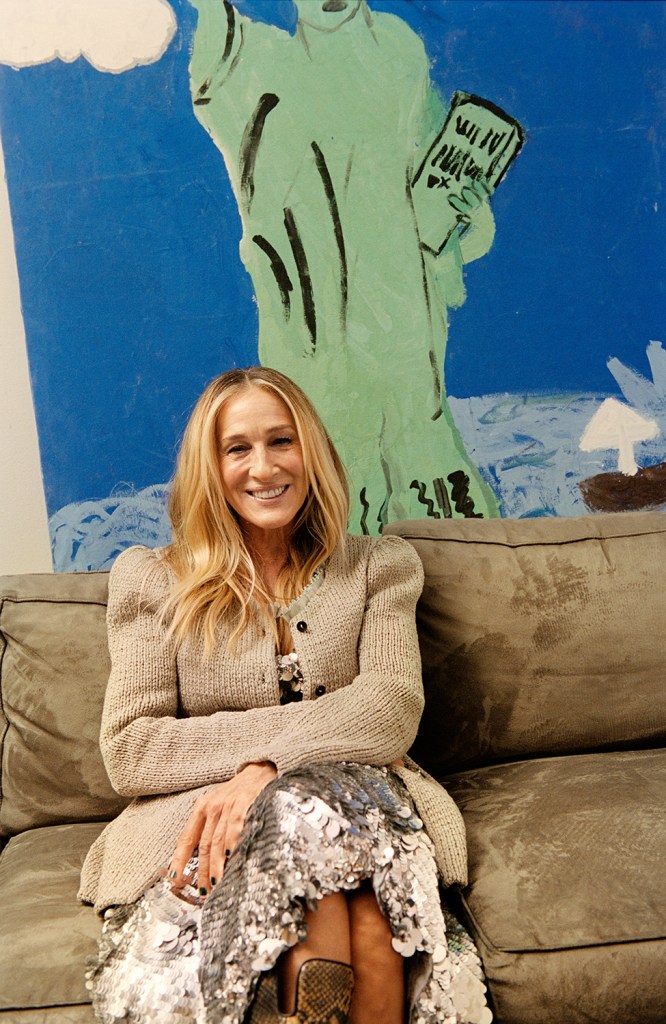 Sarah Jessica Parker sitting on a couch 