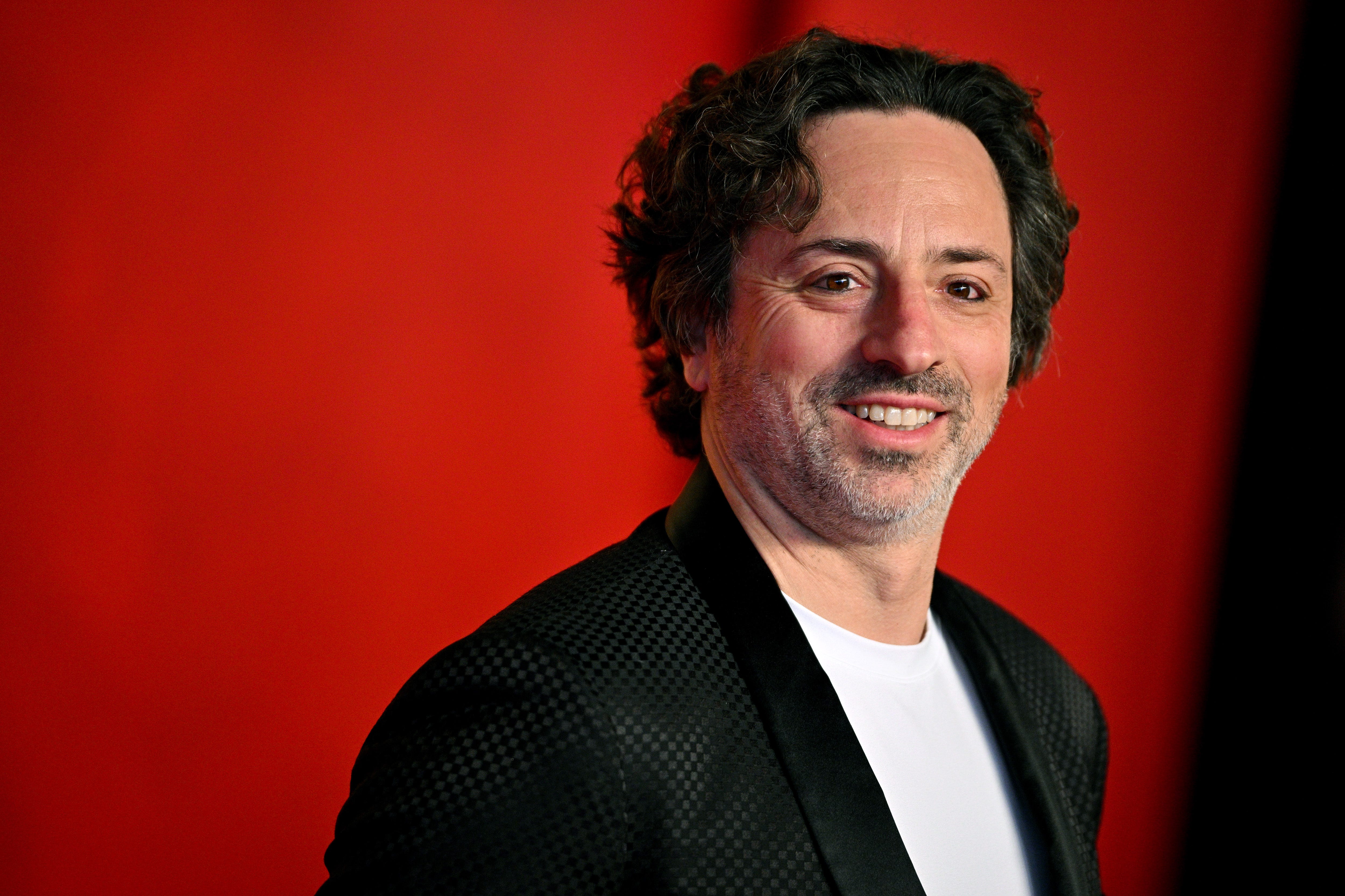 Google cofounder Sergey Brin smiles.