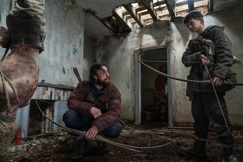 Aaron Taylor-Johnson and Alfie Williams in "28 Years Later."