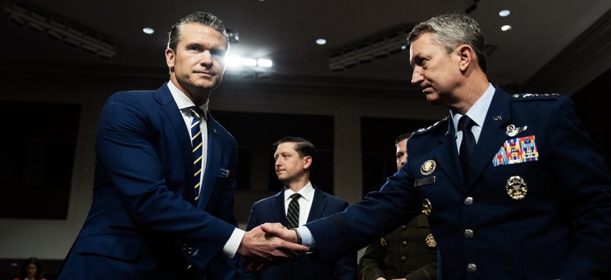Defense Secretary Pete Hegseth and Chairman of the Joint Chiefs of Staff Gen. Dan Caine arrive for a Senate Armed Services Committee hearing, June 18, 2025.