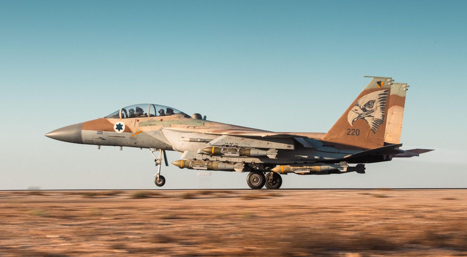 An Israeli fighter jet carrying multiple BLU-109 bombs.