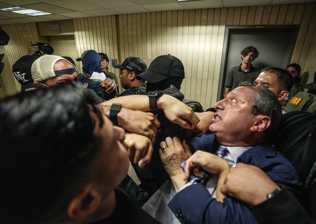 New York City Comptroller and mayoral candidate Brad Lander is placed under arrest by Immigration and Customs Enforcement ICE and FBI agents inside 26 Federal Plaza at immigration court today on June 17, 2025. 