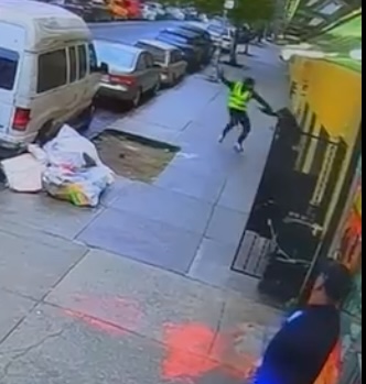 The gunman attacks Bautista on the sidewalk.