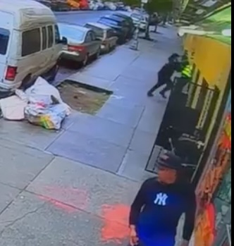 Surveillance footage of a shooting outside a Bronx bodega.