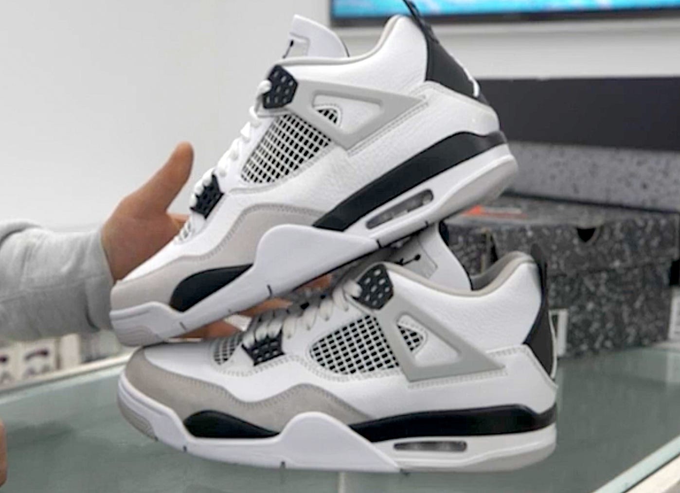 White Jordan 4s, comparing fake and real