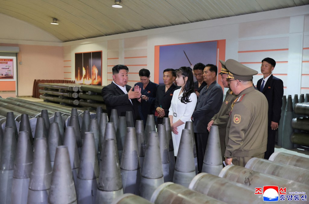 North Korean leader Kim Jong Un speaks while he inspects military factories, as he urges ramp-up in shell production to meet modern warfare demands, at an unknown location in North Korea, June 13, 2025.