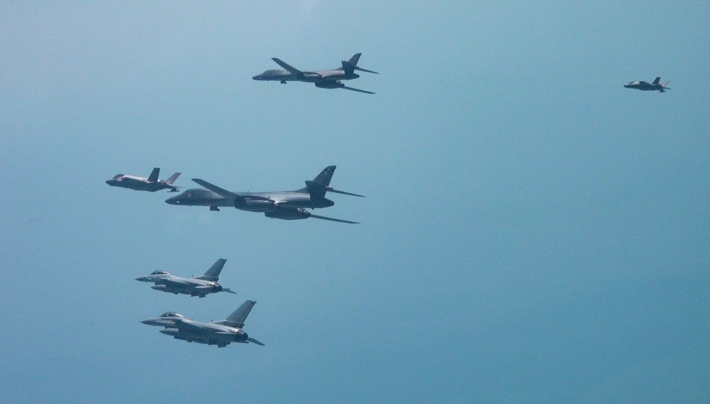 US B-1B bombers stage joint drills with South Korean and U.S. fighter jets over the Korean Peninsula sky.