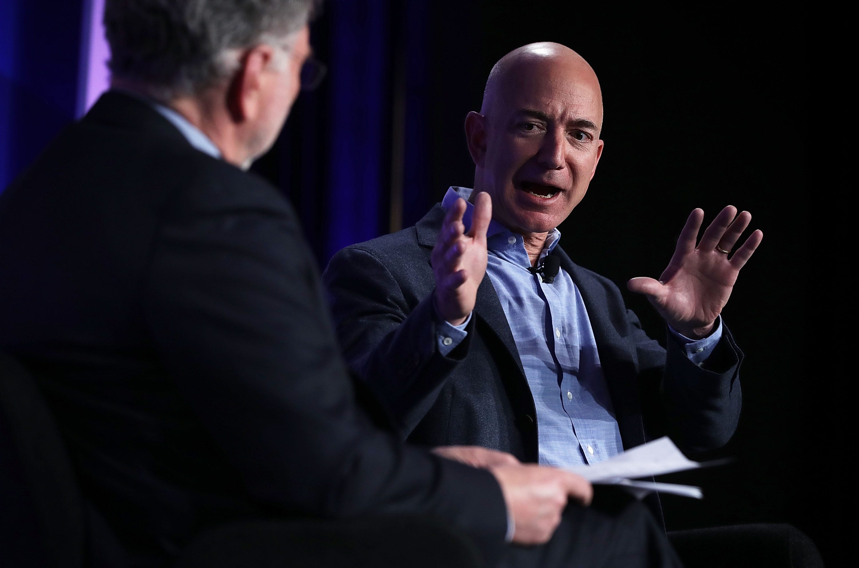 Jeff Bezos speaks and motions with his hands