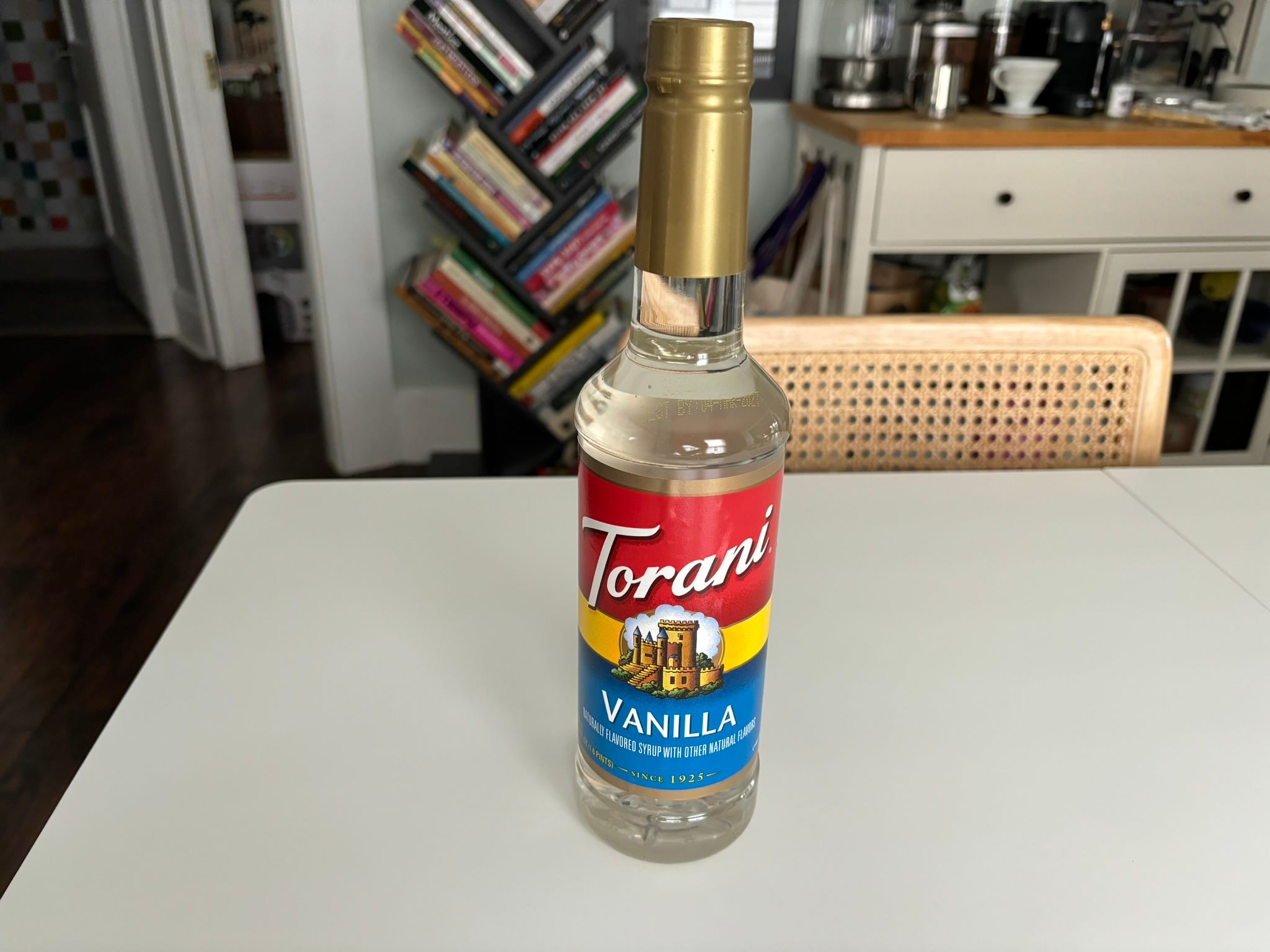 Bottle of Torani vanilla syrup on counter