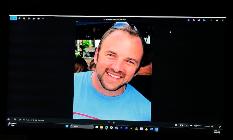 A photograph of John O'Keefe is projected during the trial of Karen Read.