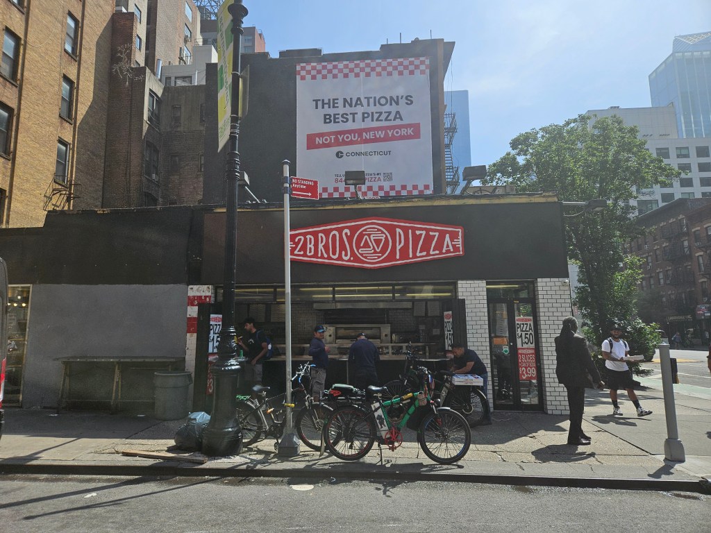 2 Bros. Pizza storefront in New York City.