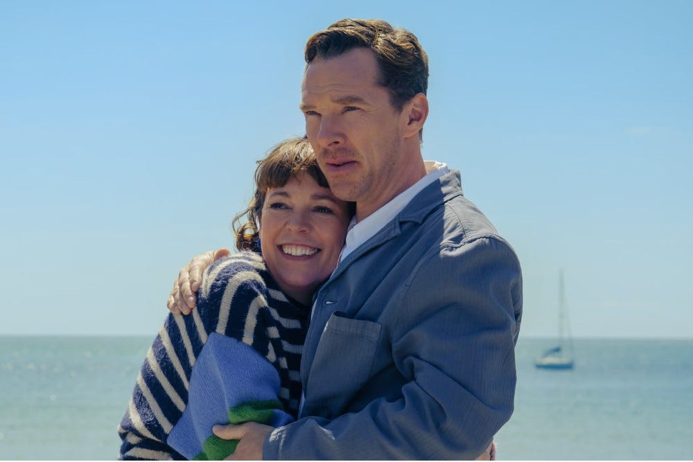 Olivia Colman and Benedict Cumberbatch with their arms around each other