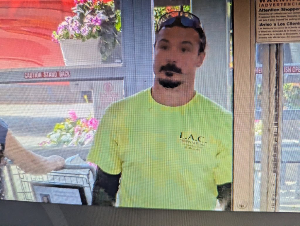 Surveillance image of Travis Decker.