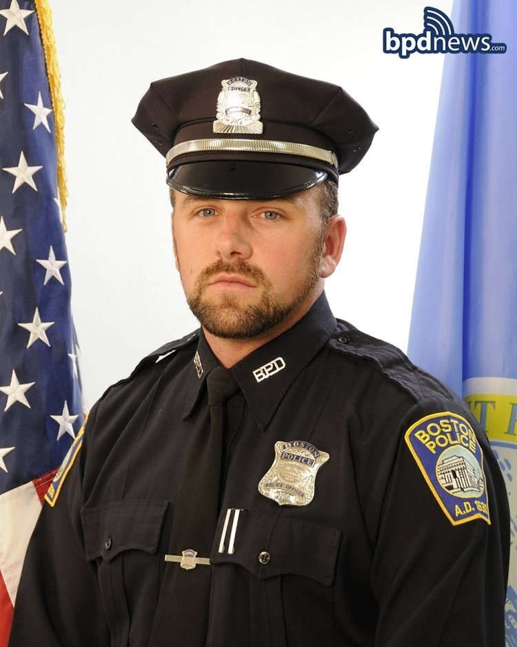 This undated photograph provided by the Boston Police Department shows officer John O'Keefe, 46, of Canton, Mass.