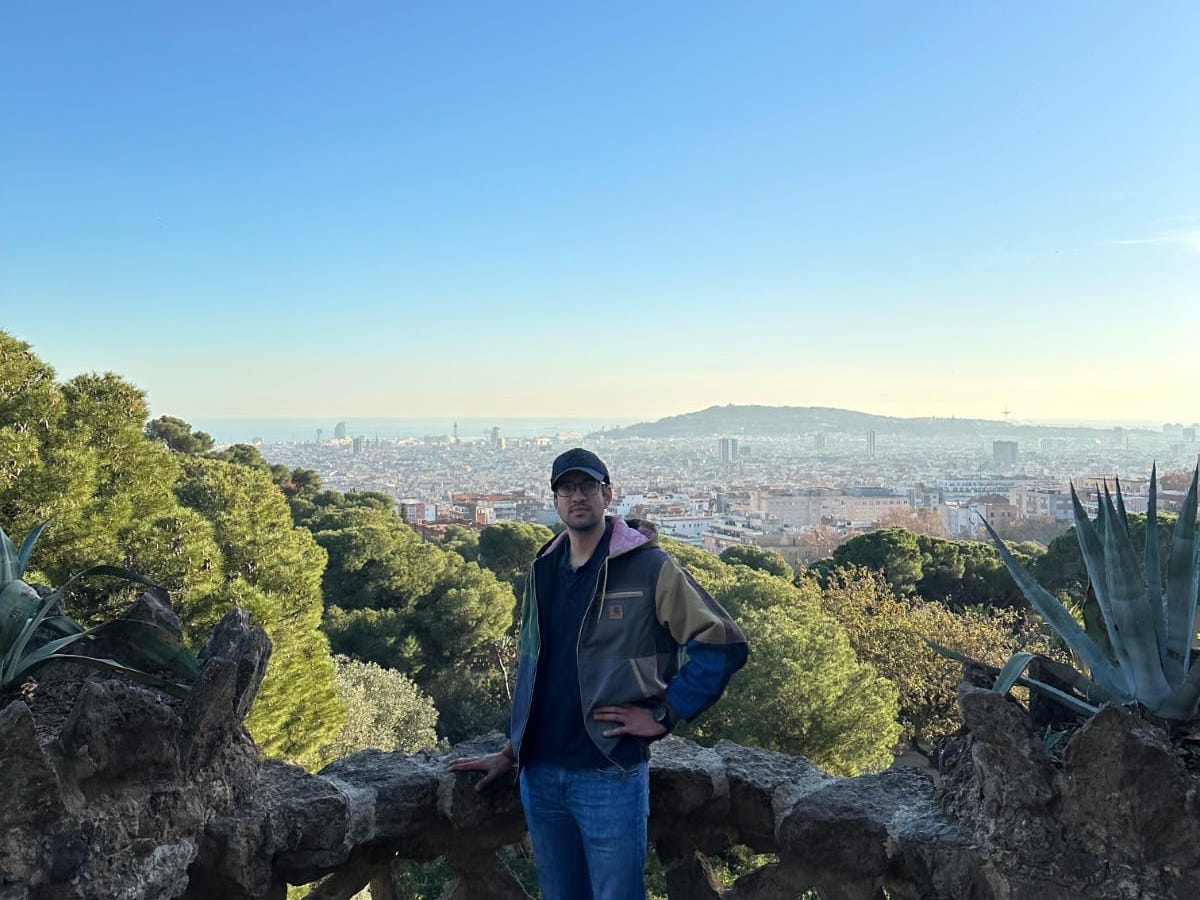 A man posing for a photo in Barcelona.