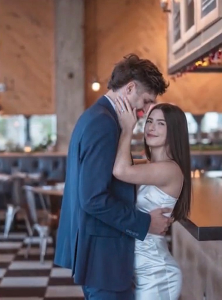 Couple embracing in a restaurant.