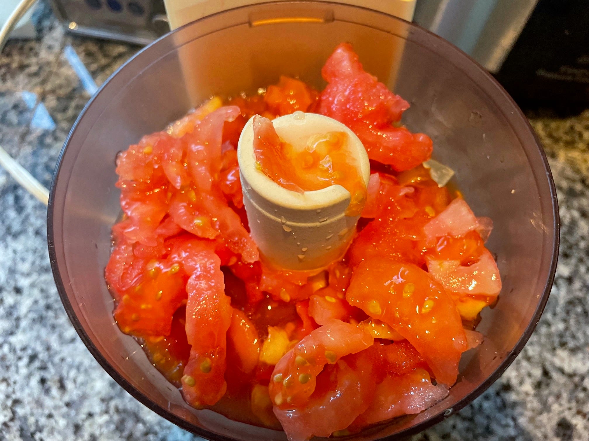 Tomato chunks in the food processor for yemista