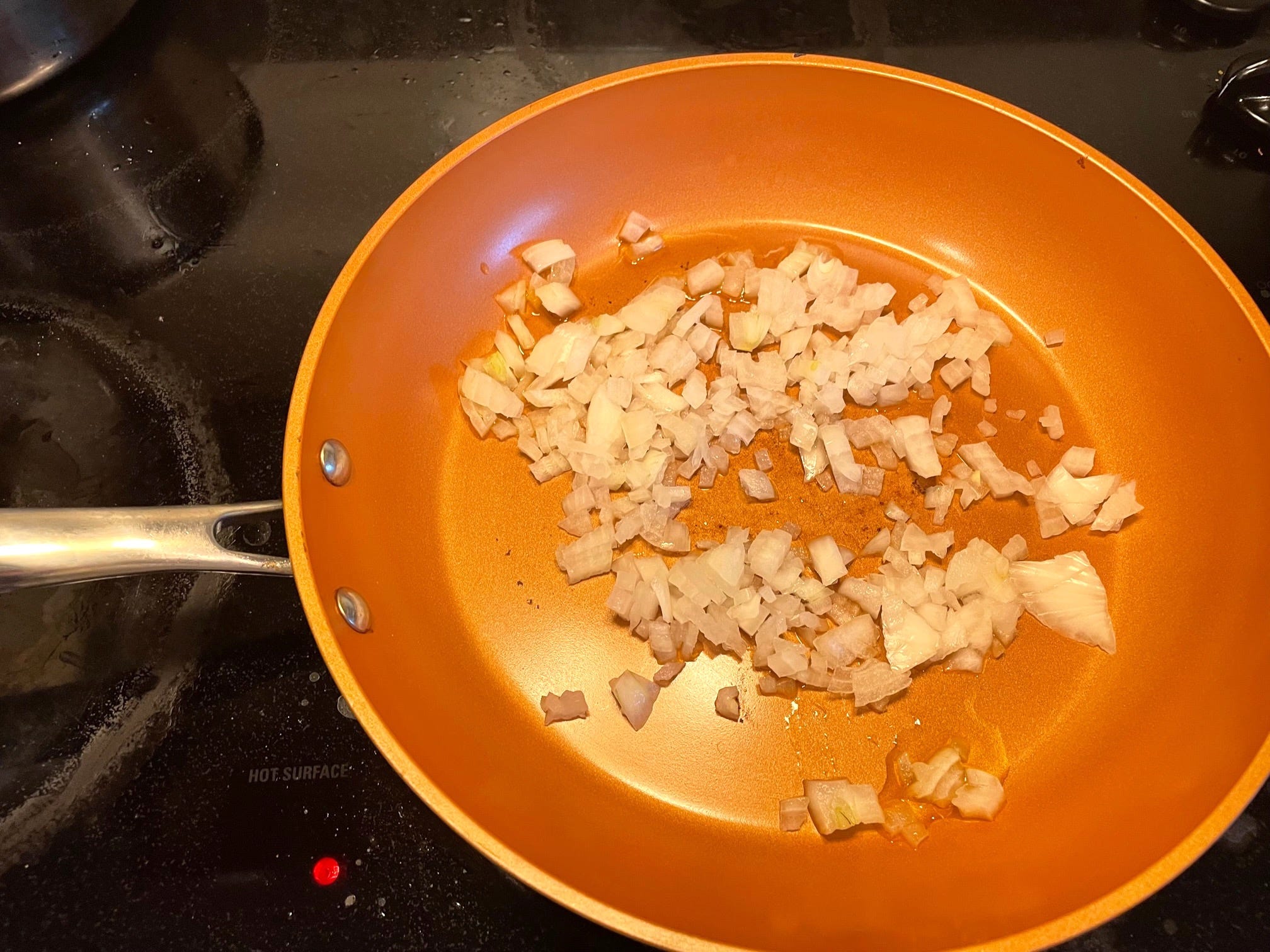 Onions in pan for yemista