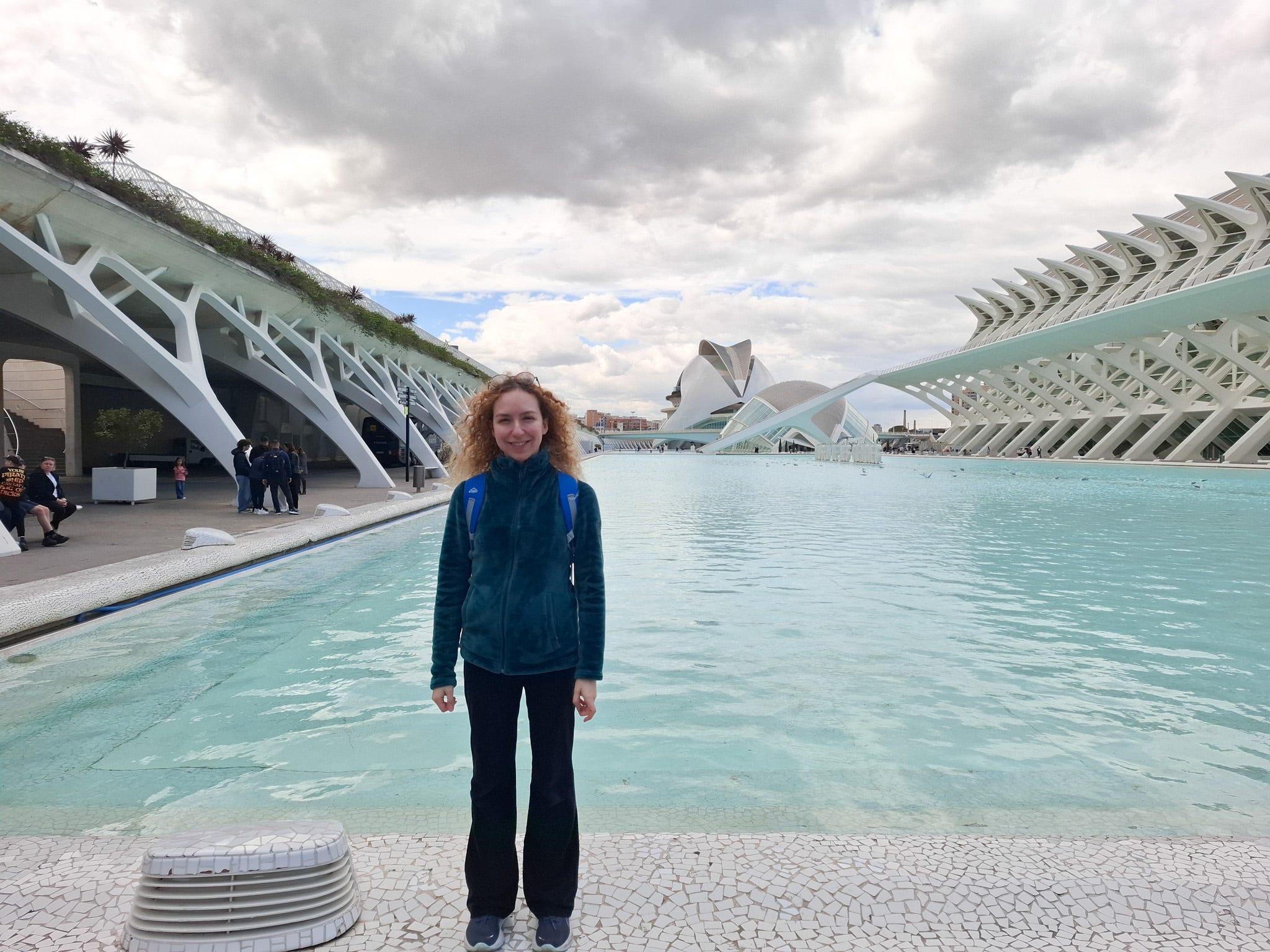 The author posing at the Museu de les Ciències Príncipe Felipe in Valencia, Spain, on an overcast day.