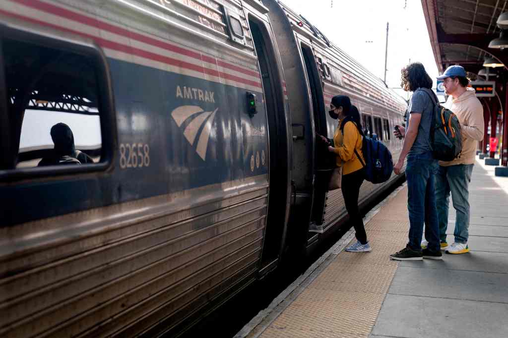 Passengers boarding an Amtrak train.
