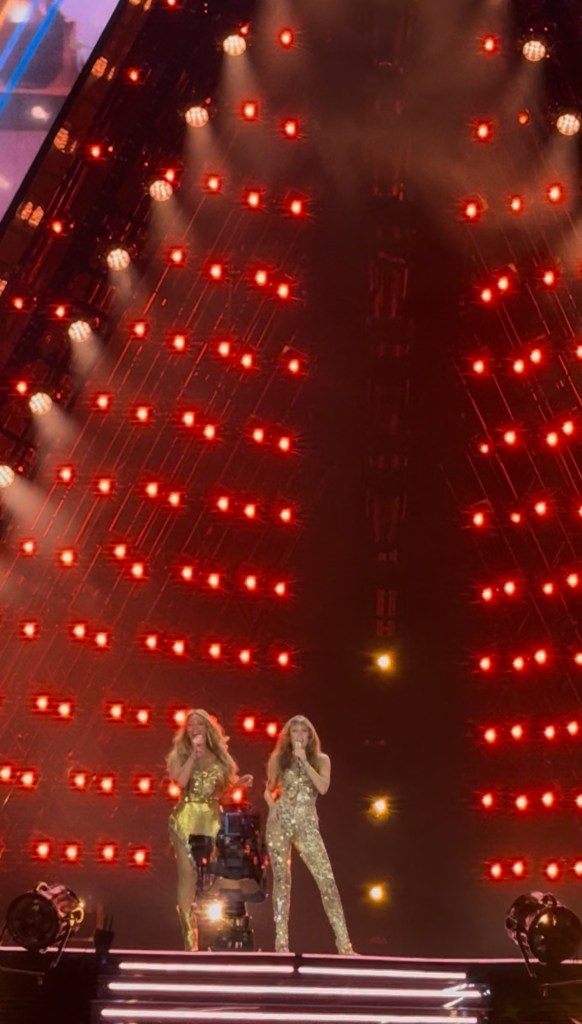 Beyoncé and Miley Cyrus in gold looks during duet in Paris
