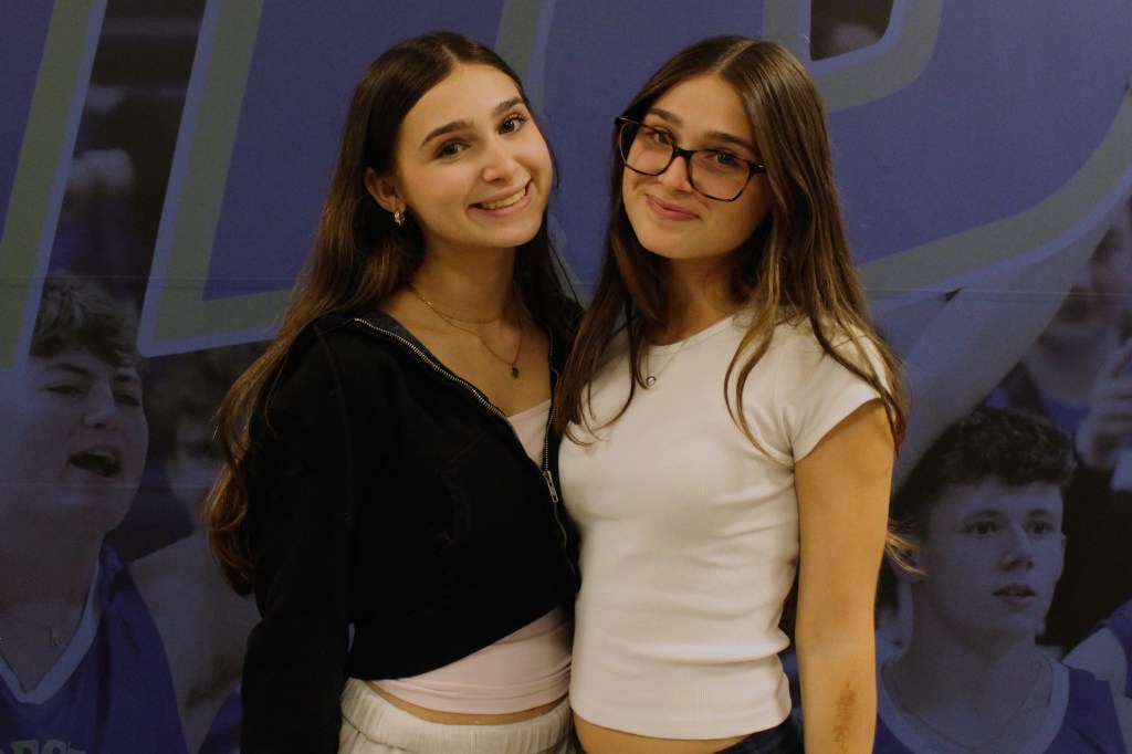 Two twin girls graduating.