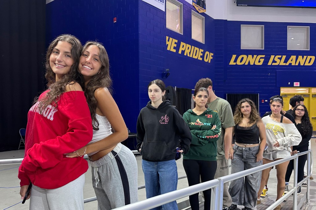 Graduating twins with friends.