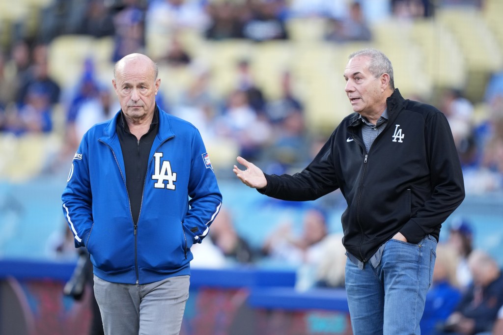 Los Angeles Dodgers president Stan Kasten and executive vice president Lon Rosen at a game.