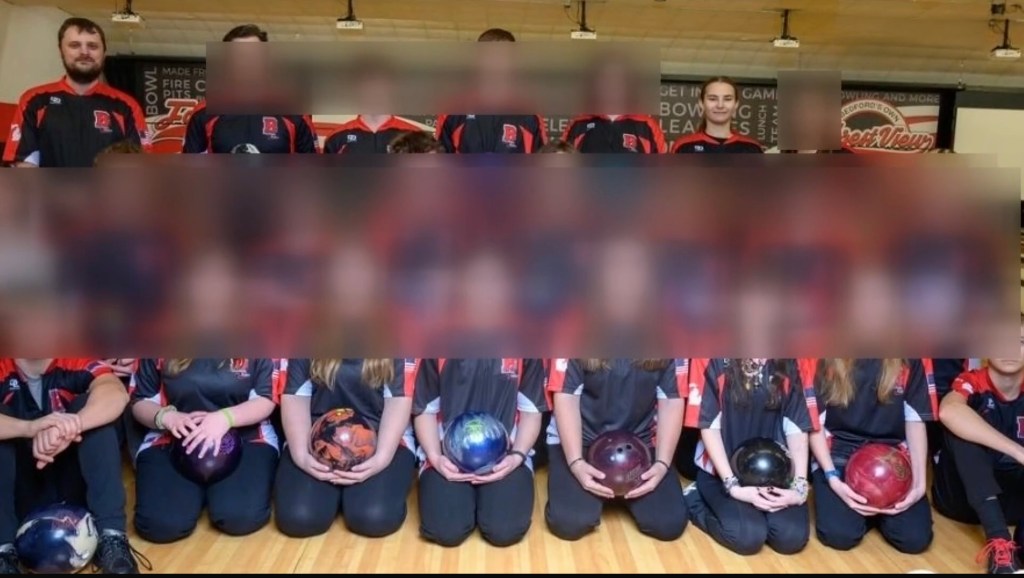 Ryne Leist photgraphed with the Bedford High School Club Bowling team, including Smith, in the school's 2024-2025 school yearbook.