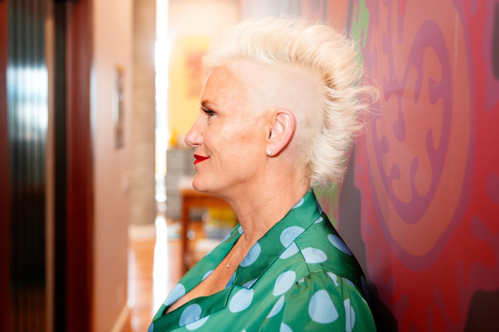 Anne Burrell posing for a profile photo. 