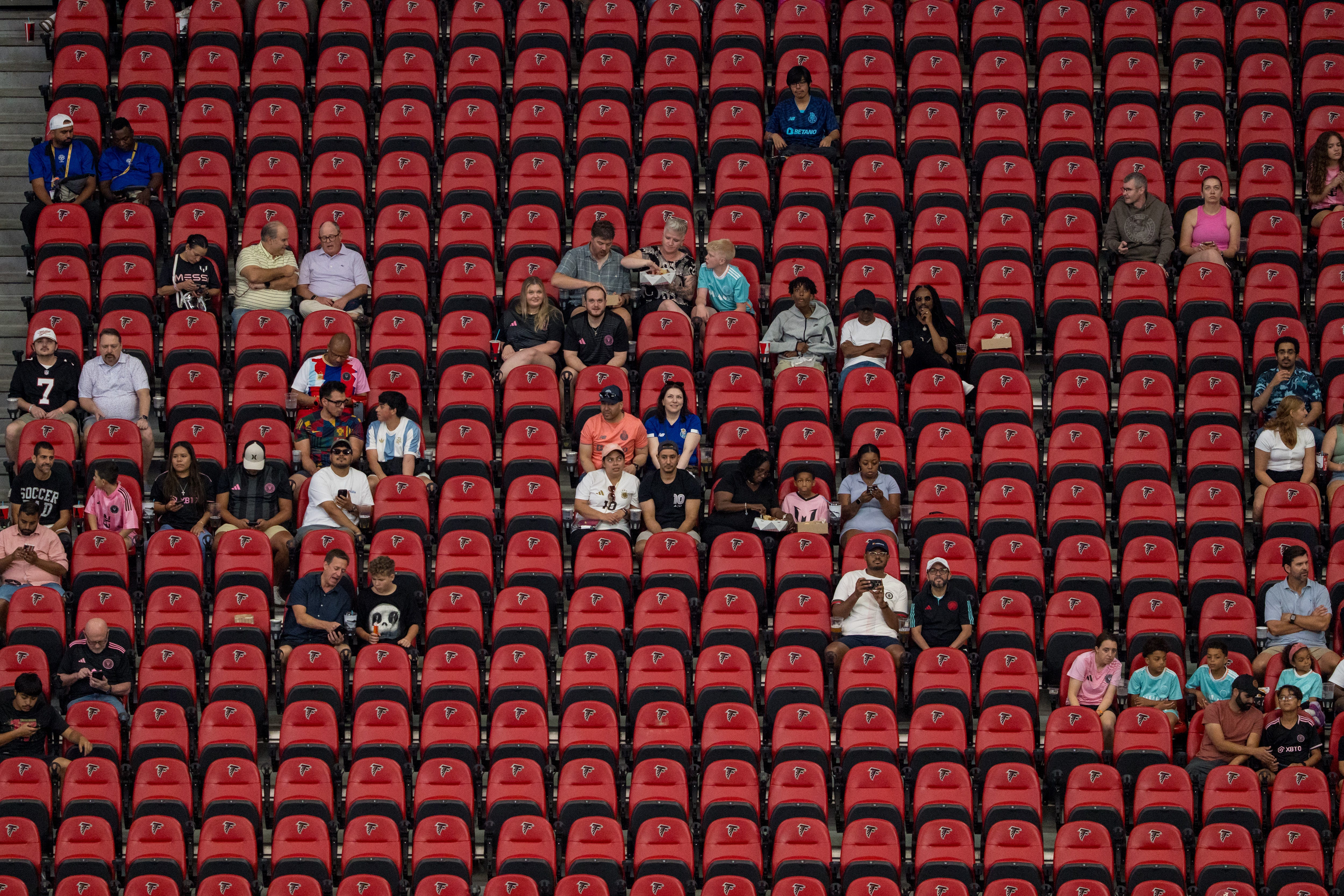 Fans and empty seats in the Mercedes-Benz Stadium during the first half FIFA Club World Cup 2025 group A match between Internacional CF Miami and FC Porto at Mercedes-Benz Stadium on June 19, 2025 in Atlanta, Georgia.